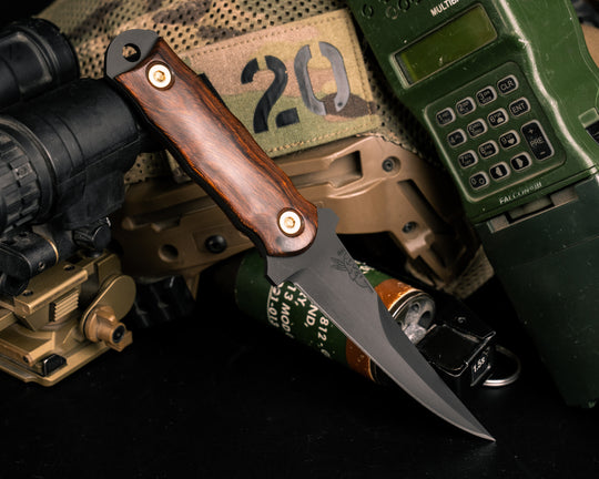 Combat Filet - Desert Ironwood, Armor Black Cerakote, Brass Bolts, Smooth Grip.