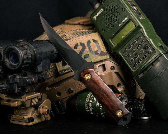 Combat Filet - Desert Ironwood, Armor Black Cerakote, Brass Bolts, Smooth Grip.