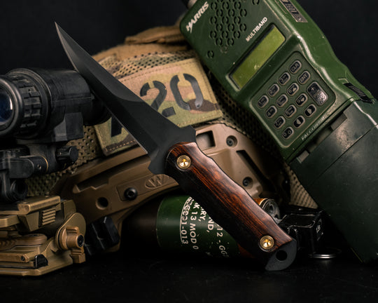 Combat Filet - Desert Ironwood, Armor Black Cerakote, Brass Bolts, Smooth Grip.