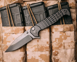 Crow Folder- Anodized black frame, nitride black blade, grenade stippled Grip, deep carry pocket clip