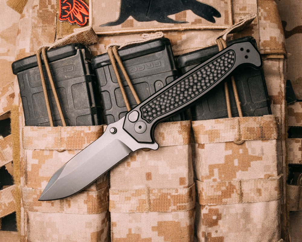 Disaster Folder, Anodized black handle, black nitride frame, dimpled Grip, deep carry pocket clip