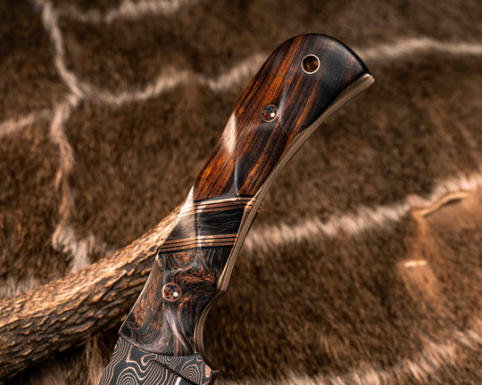 Cavner- Baker Forge CopperMai Raindrop Ni Shim- Copper Dark Matter Carbon, Black G10 and Copper Pin Striping, Copper Dark Matter Carbon Split, Desert Ironwood, Copper Patriot Mosaic Pins, Copper Lanyard Pin, Textured Grip