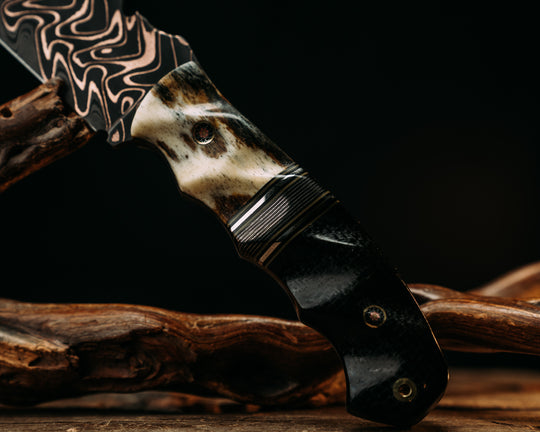 Notched Disaster Breacher- Baker Forge "Fury" Chevron CopperMai Dama Core- Dyed Giraffe Bone, Black G10, OD Green G10 & Aluminum Pin Striping, Silver Dragon Strike Carbon Split, Black Burlap Micarta, Mosaic Pins, Brass Lanyard Pin, Textured Grip