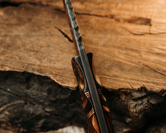 Cavner- Baker Forge CopperMai Raindrop Ni Shim- Copper Dark Matter Carbon, Black G10 and Copper Pin Striping, Copper Dark Matter Carbon Split, Desert Ironwood, Copper Patriot Mosaic Pins, Copper Lanyard Pin, Textured Grip