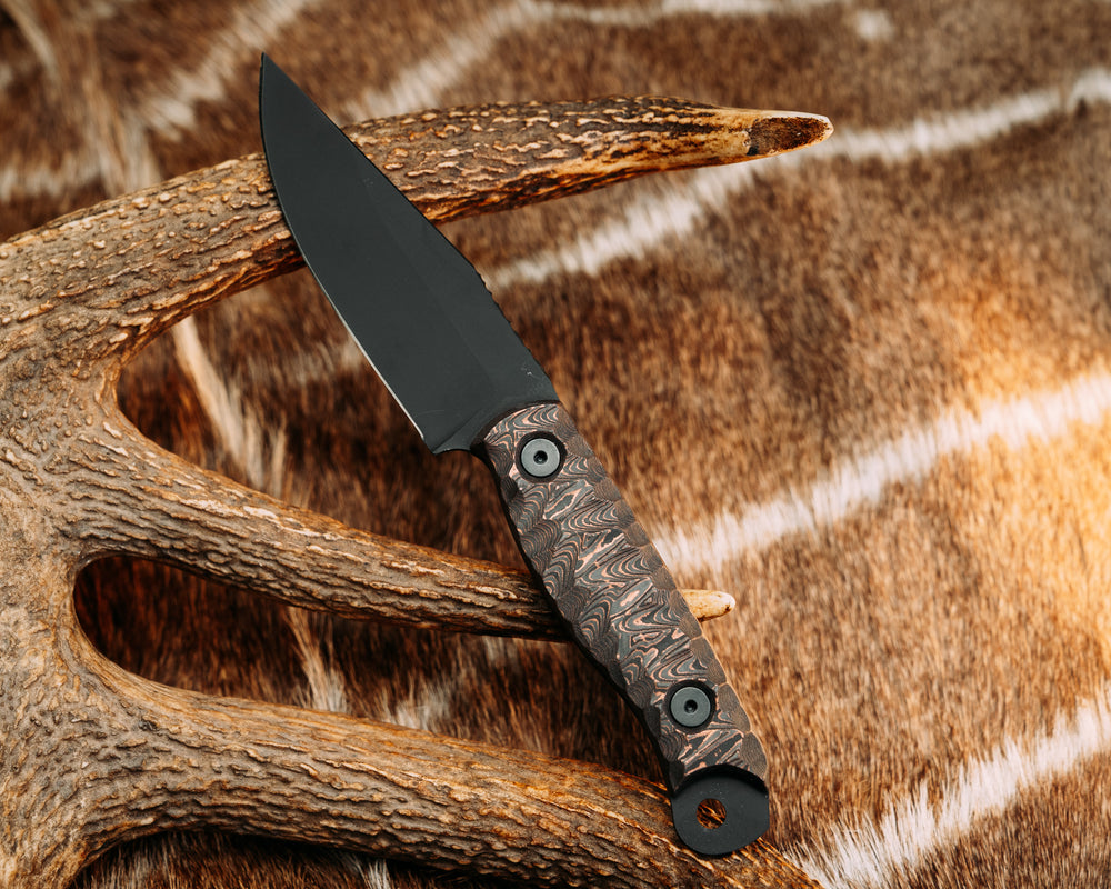 Crow Scalper - Copper Camo Carbon, Armor Black Cerakote, Allen Bolts, Chaos Grip.