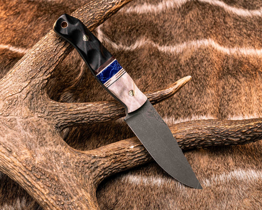 Crow Jr- Elk Antler, Black G10, White G10 and Copper Pin Striping, Sodalite Tru-stone and Brown Canvas Micarta Split, Desert Ironwood, Mosaic Pins, Copper Lanyard Pin, Textured Grip