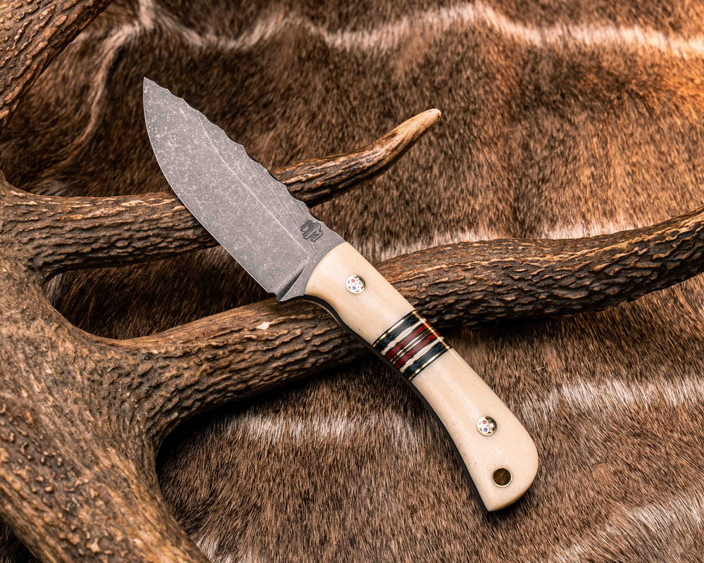Cav Jr- Giraffe Bone, Black G10, Brass, Navy Canvas Micarta, White G10, Red Canvas Micarta Split, Patriot Mosaic Pins, Brass Lanyard Pin, Smooth Grip