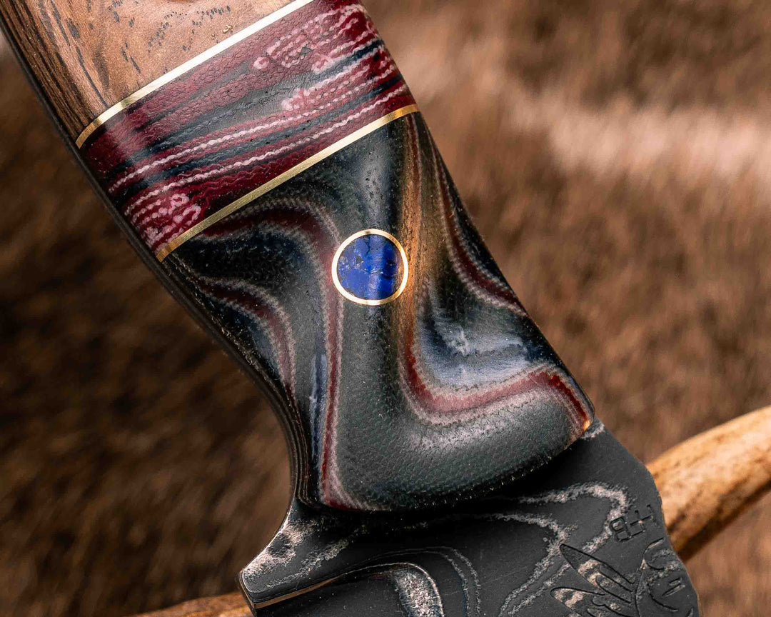 Crow Scout-Sherman Tank SanMai Damascus- Geronimo Lapis Azuli Stone Inlay from Abbottabad Pakistan, WWI,WWII, Vietnam & Modern SEAL Cammie Micarta, American Flag Split, White Oak from the U.S.S. Constitution, Lapis in Brass Pins, Textured Grip