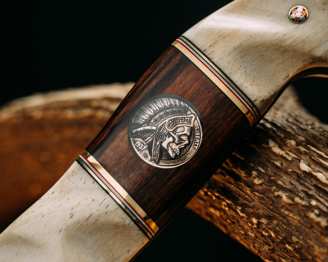 Warbird- Giraffe Bone, Black G10, Brass, Blue G10, White G10 and Cherry G10 Pin Striping, Desert Ironwood, 1937 ATX Engraving Headdress Buffalo Nickel Inlay, Mosaic Pins, 1/8" Mosaic Pins, Textured Grip