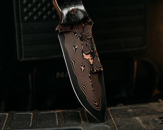 Disaster Cub- Baker Forge Raindrop CopperMai- Carbon Fiber, Black G10 and Brass Split, Elk Antler, Mosaic Pins, Brass Lanyard Pin, Textured Grip