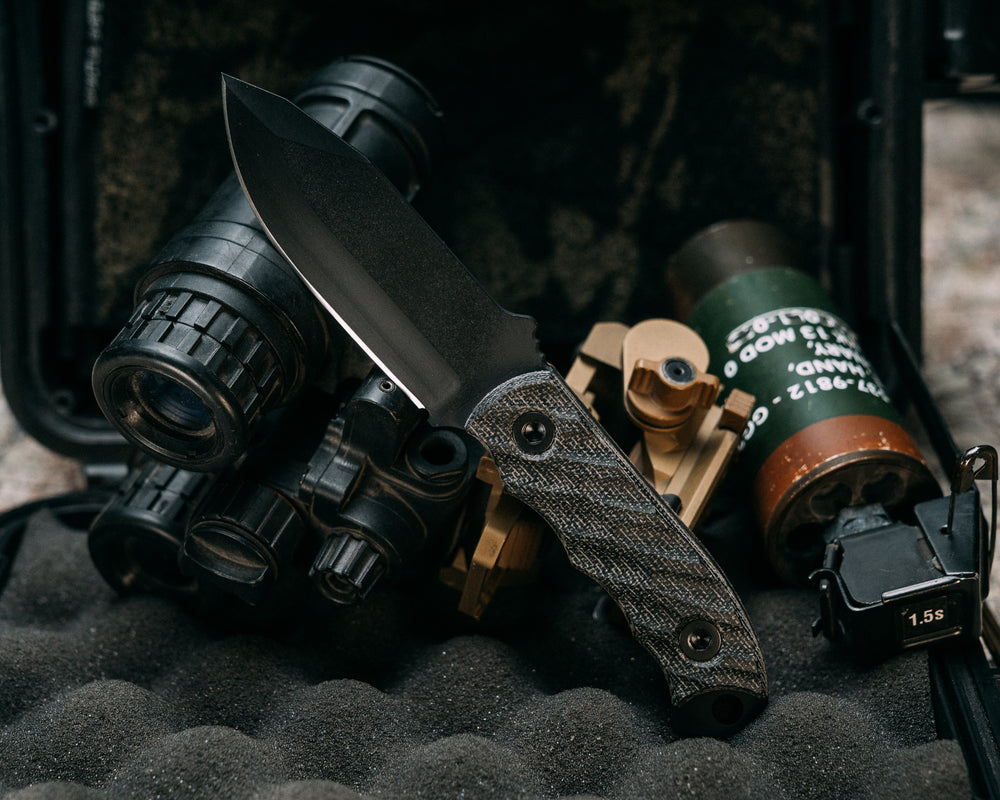 Disaster Cub- Black Canvas Micarta, Armor Black Cerakote, Allen Bolts, Iron Grip