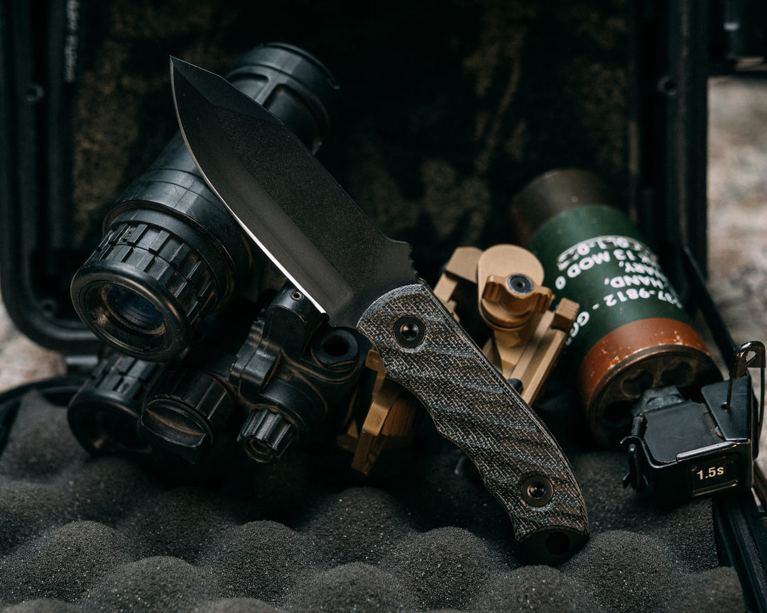 Disaster Cub- Black Canvas Micarta, Armor Black Cerakote, Allen Bolts, Iron Grip