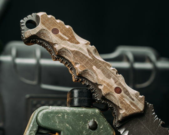 Notched Disaster Breacher- Desert Tiger Stripe Cammie Micarta, Brown Micarta Pins, Textured GripRock Worked Spine