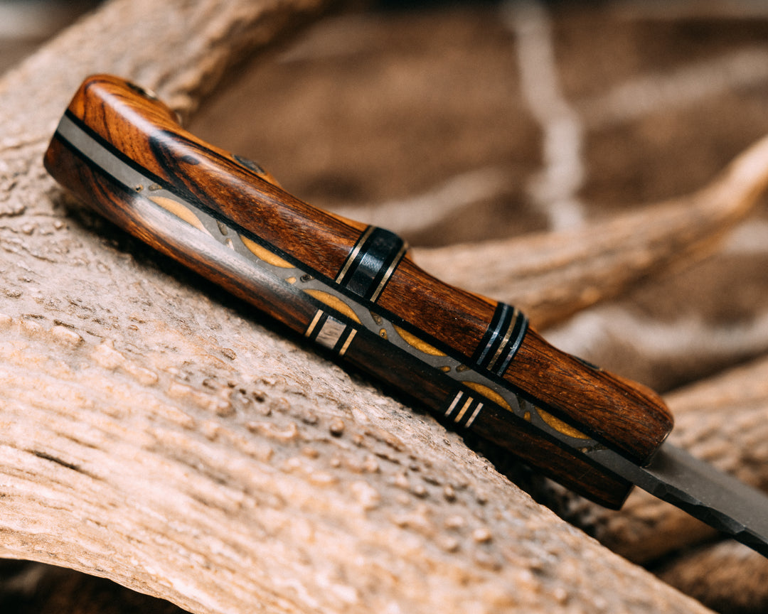 Crow Scalper- Desert Ironwood, Black G10, Aluminum and Brass Pin Striping, Desert Ironwood Split, Mosaic Pins, Grooved Grip