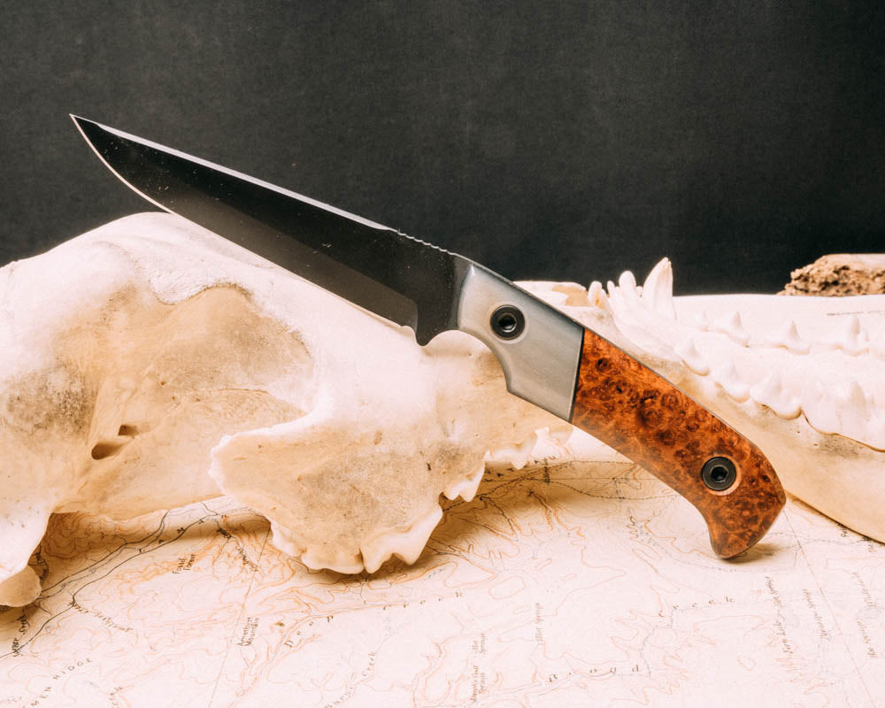 Boogeyman- Rams horn, black G10 split, Amboyna Burl, armor black cerakote, allen bolts, smooth grip