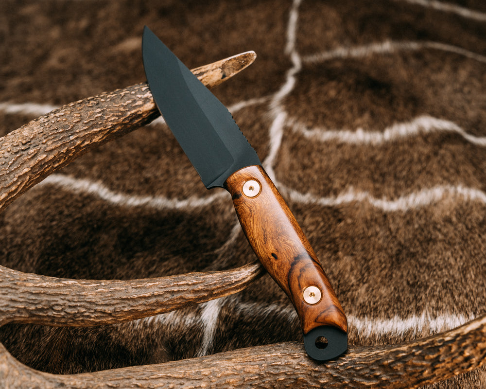 Crow Scalper - Desert Ironwood, Armor Black Cerakote, Brass Allen Bolts, Smooth Grip.