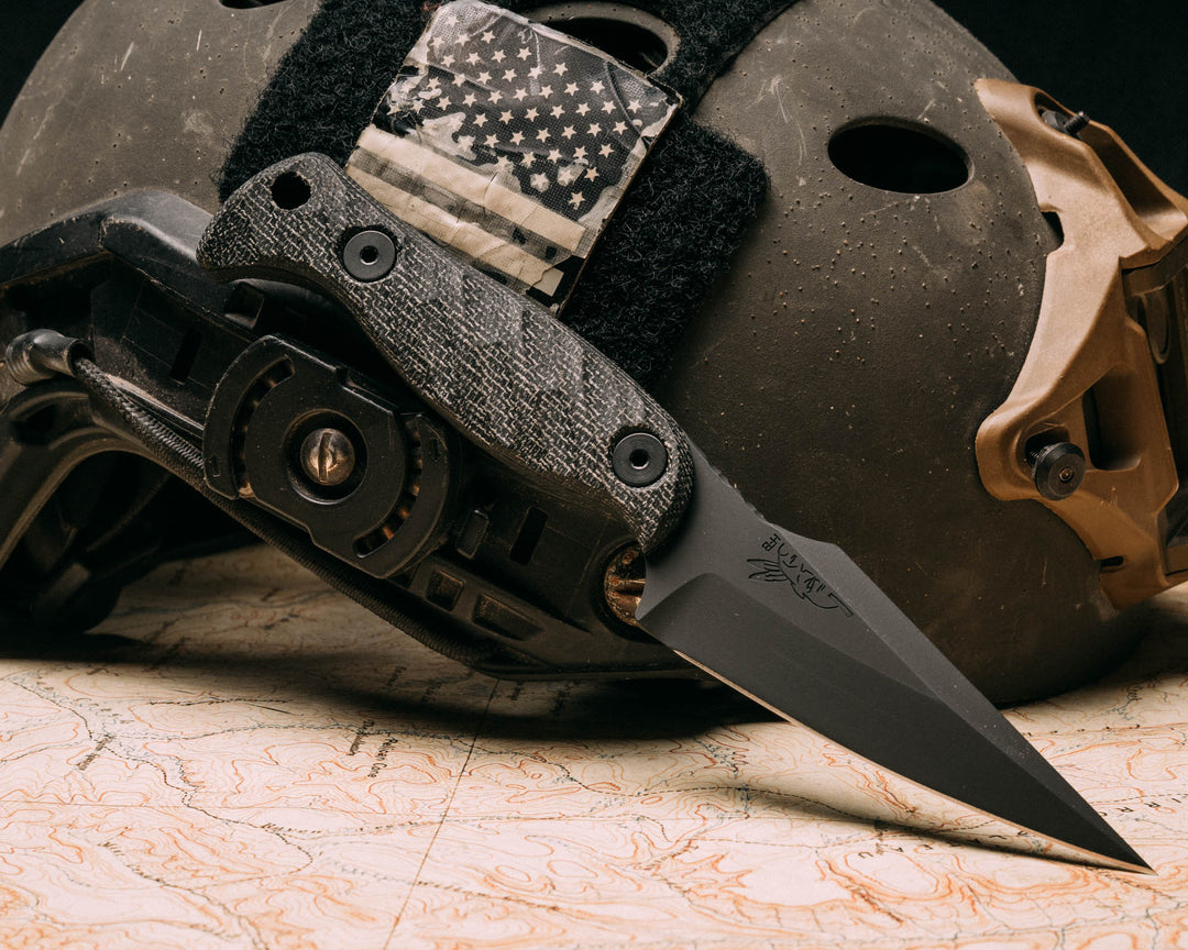 Gulo Gulo- Black canvas micarta, Armor Black cerakote, allen bolts, textured grip