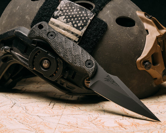 Gulo Gulo- Black canvas micarta, Armor Black cerakote, allen bolts, textured grip