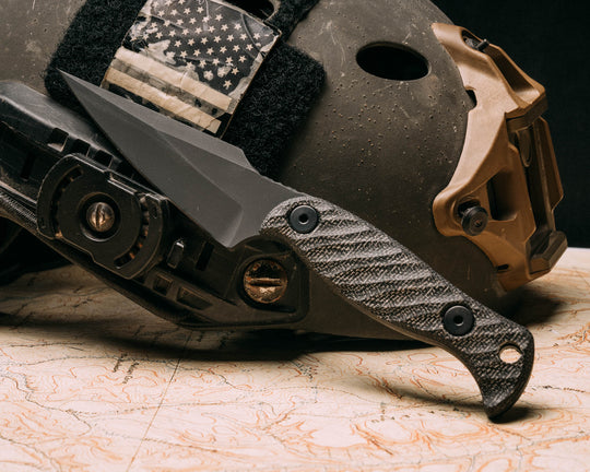 Gulo Gulo- Black canvas micarta, Armor Black cerakote, allen bolts, textured grip