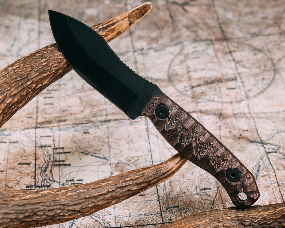 Skinner Jr - Copper Camo CF, Armor Black Cerakote, Allen Bolts, Chaos Grip.