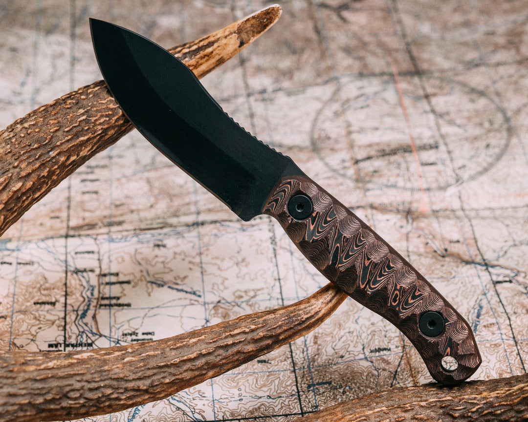 Skinner Jr - Copper Camo CF, Armor Black Cerakote, Allen Bolts, Chaos Grip.