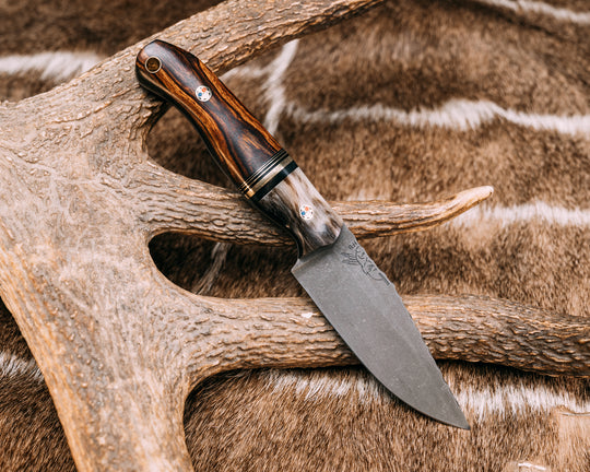 Crow Scalper- Rams Horn, Black G10 and Brass Split, Desert Ironwood, Patriot Mosaic Pins, Brass Lanyard Pin, Contoured Grip