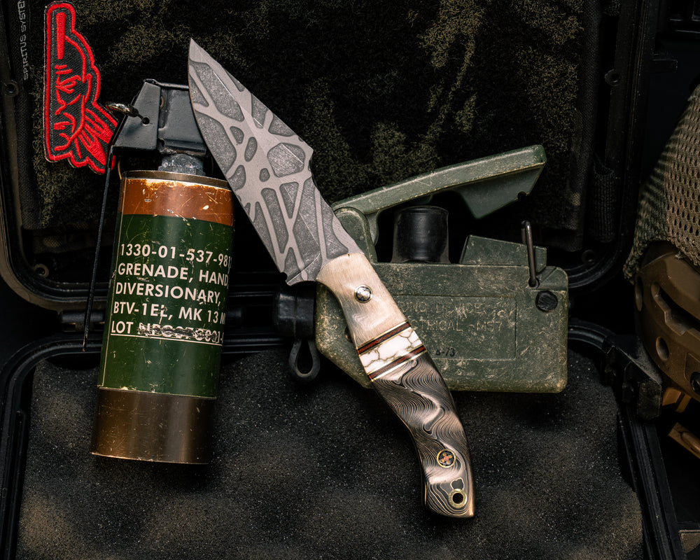 Widow Maker JR- Rams Horn, Brass, Black G10 and Brown Canvas Micarta Pin Striping, White with Gold Web Tru-stone Split, Gold Camo Carbon, Mosaic Pins, Brass Lanyard Pin, Textured Grip