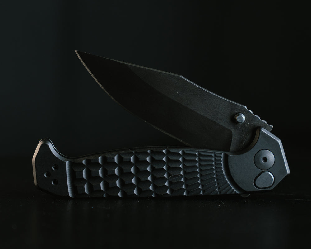 Crow Folder- Anodized Black Frame, Nitride Black Blade, Grenade Stippled Grip, Deep Carry Pocket Clip