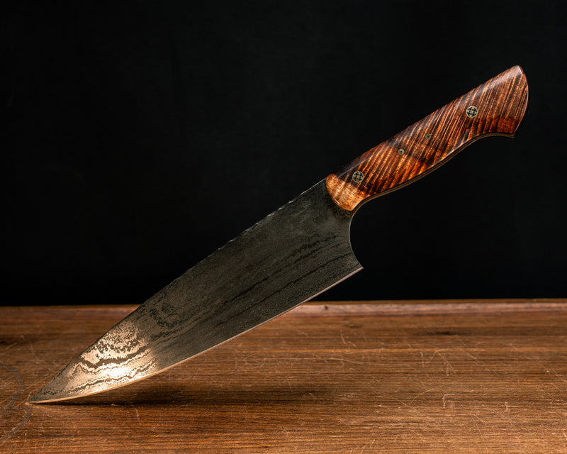 Chef Blade- Baker Forge Random Pattern Stainless Damascus- Hawaiian Curly Koa, Black G10 and Brass Liner, Mosaic Pins, Smooth Grip