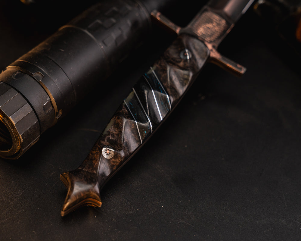 V-42 Dagger- Baker Forge Random Pattern CopperMai- Dyed Redwood, Black G10 and Aluminum Pin Striping, Blue Dark Matter Carbon and Black Canvas Micarta Split, Mosaic Pins, Textured Grip
