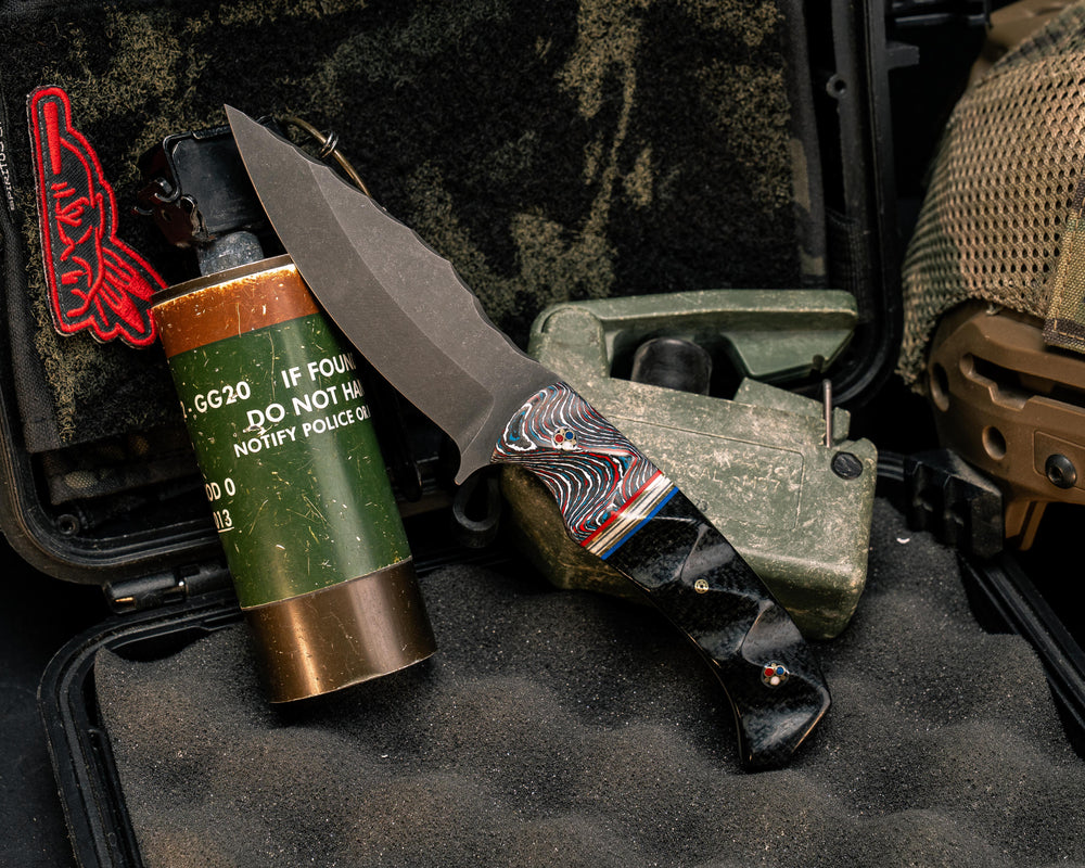 Ishi- Nebula FAT Carbon, Red G10, Brass, White G10 and Blue G10 Split, Black Burlap Micarta, Patriot Mosaic Pins, 1/8" Mosaic Pin, Textured Grip