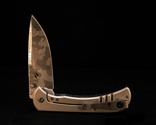 Cav Folder - Black G10, Acid Splash, Textured Grip, TI Frame.