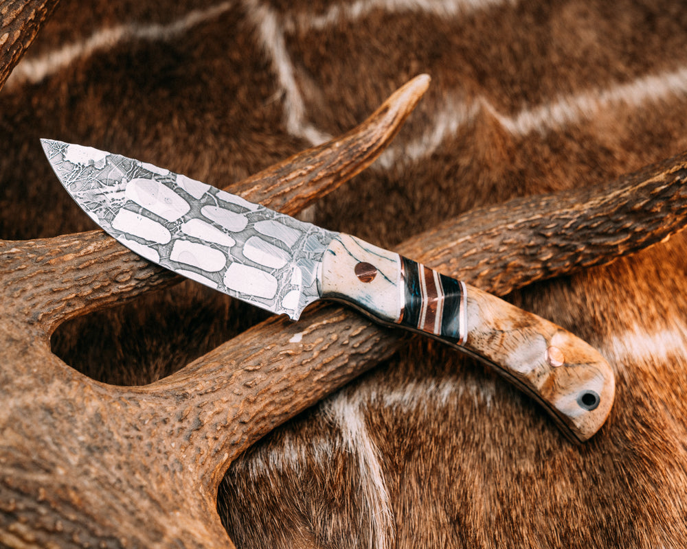 Cav Jr Back Country- Dyed Giraffe Bone, White G10 and Copper Pin Striping, Blue Marbled Carbon and Copper Split, Hawaiian Curly Mango, Copper Pins, CF Lanyard Pin, Textured Grip
