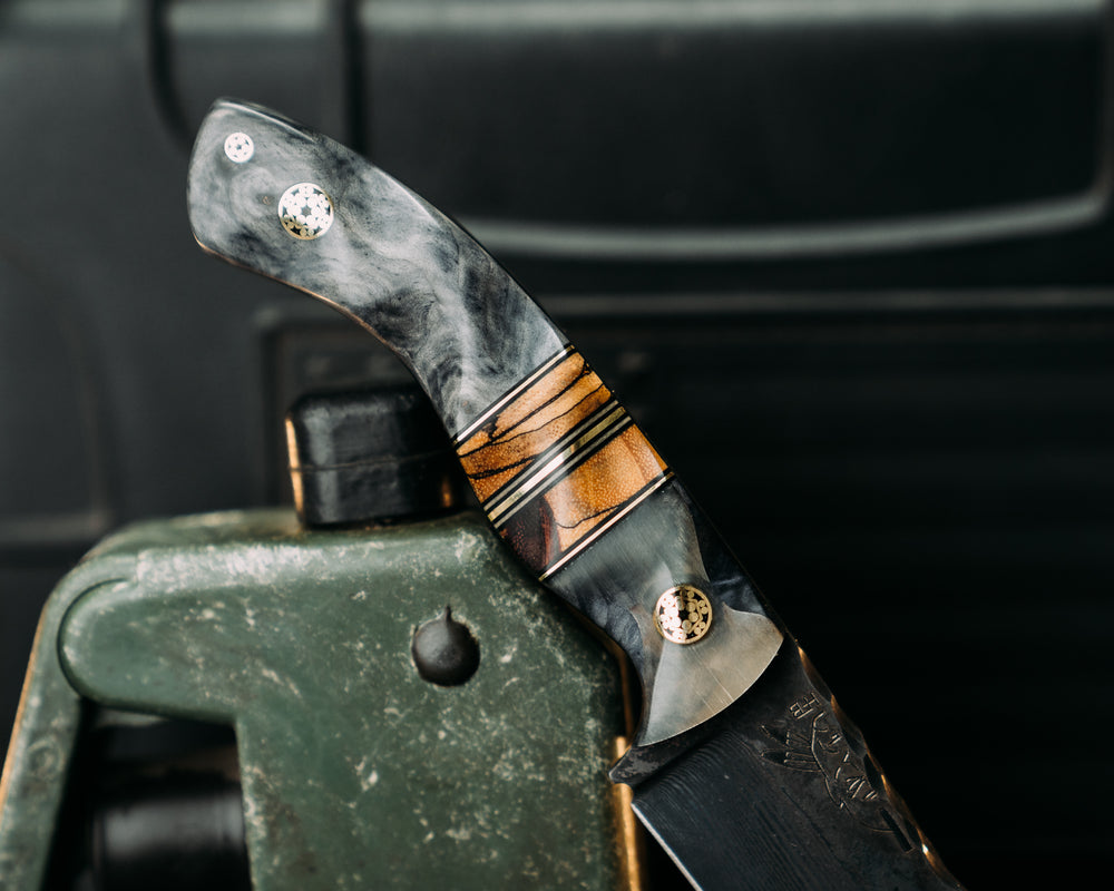 Widow Maker Jr- Baker Forge Random Pattern Damascus- Rams Horn Over Dyed Maple, Black G10 and Brass Pin Striping, Spalted Maple Split, Mosaic Pins, 1/8" Mosaic Pin, Textured Grip