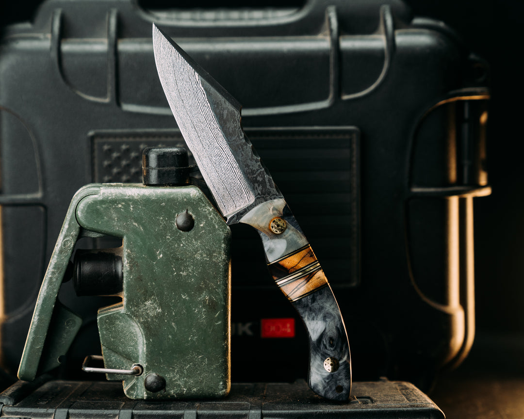 Widow Maker Jr- Baker Forge Random Pattern Damascus- Rams Horn Over Dyed Maple, Black G10 and Brass Pin Striping, Spalted Maple Split, Mosaic Pins, 1/8" Mosaic Pin, Textured Grip