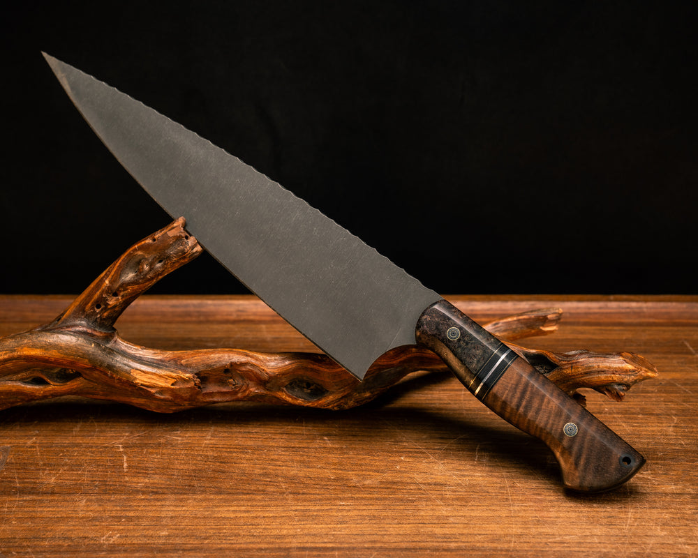 Chef Blade 10"- Dyed Black Ash, Black G10, Brass, and Aluminum Split, Hawaiian Curly Koa, Mosaic Pins, CF Lanyard Pin, Smooth Grip