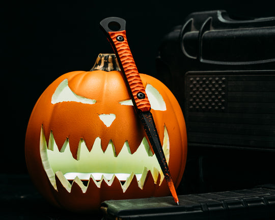 Cardiac Spike (2025 Halloween Edition)  - Hunter Orange G10, Armor Black Cerakote w/ Orange Splatter, Allen Bolts, Iron Grip.