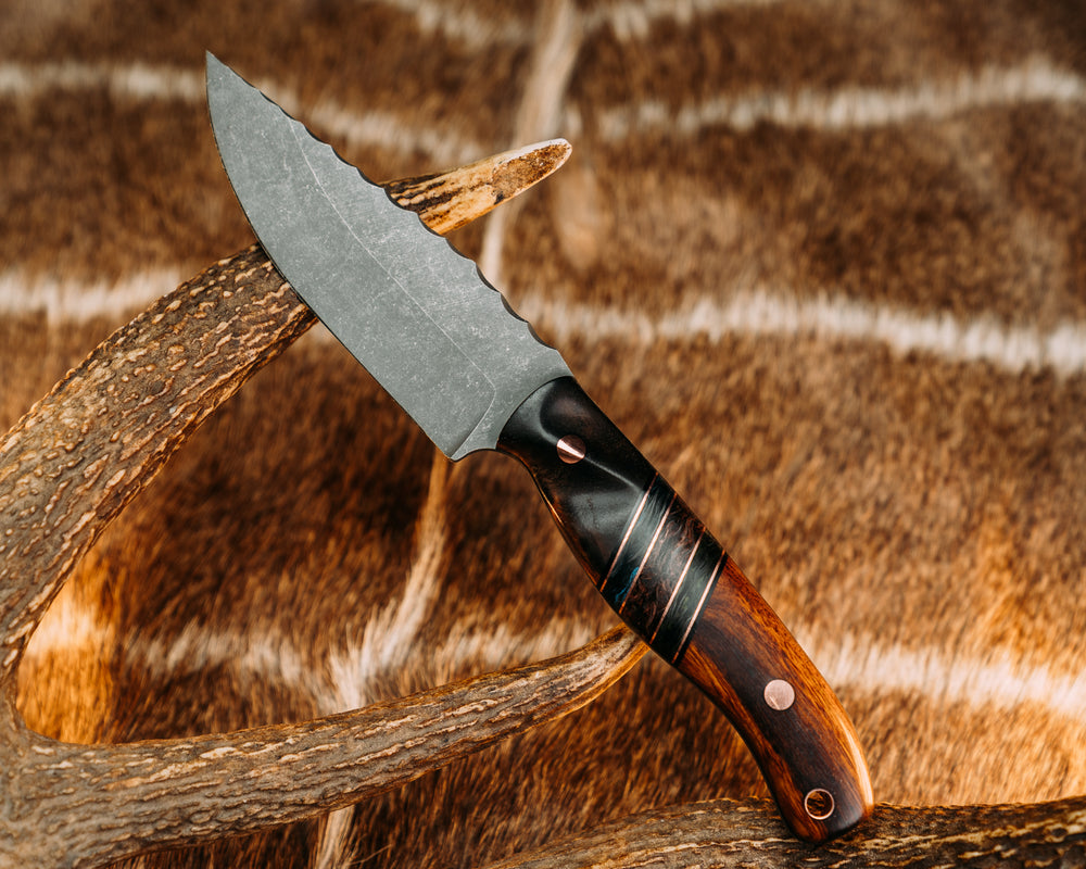 Crow Jr- Hawaiian Curly Koa, Black G10 and Copper Pin Striping, Blue Dark Matter Carbon, Copper Dark Matter Carbon and Green Dark Matter Carbon Split, Desert Ironwood, Copper Pins, Copper Lanyard Pin, Contoured Grip