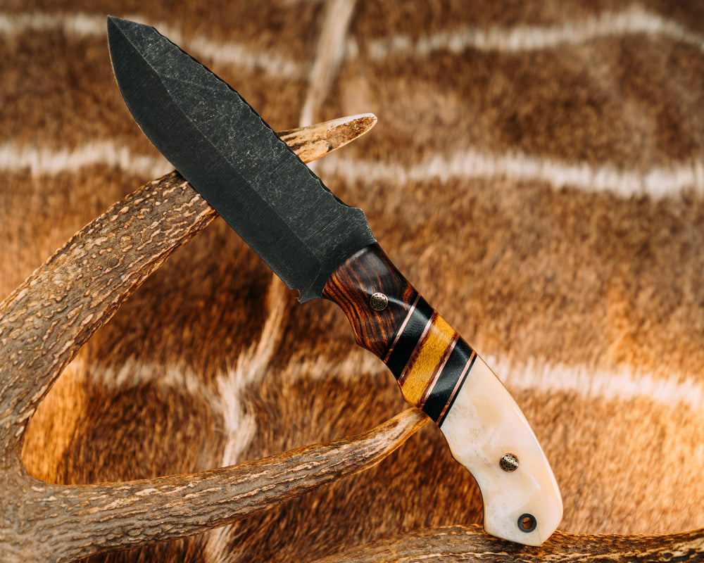 Disaster Breacher- Desert Ironwood, Black G10 and Copper Pin Striping, Black Canvas Micarta and Vintage Butterscotch Micarta Split, Giraffe Bone, Mosaic Pins, CF Lanyard Pin, Grooved Grip