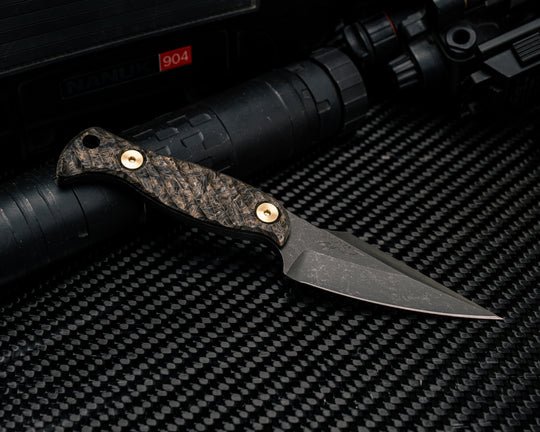 Gulo Gulo - Dark Matter Gold Carbon Fiber, Brass Bolts, Iron Grip.
