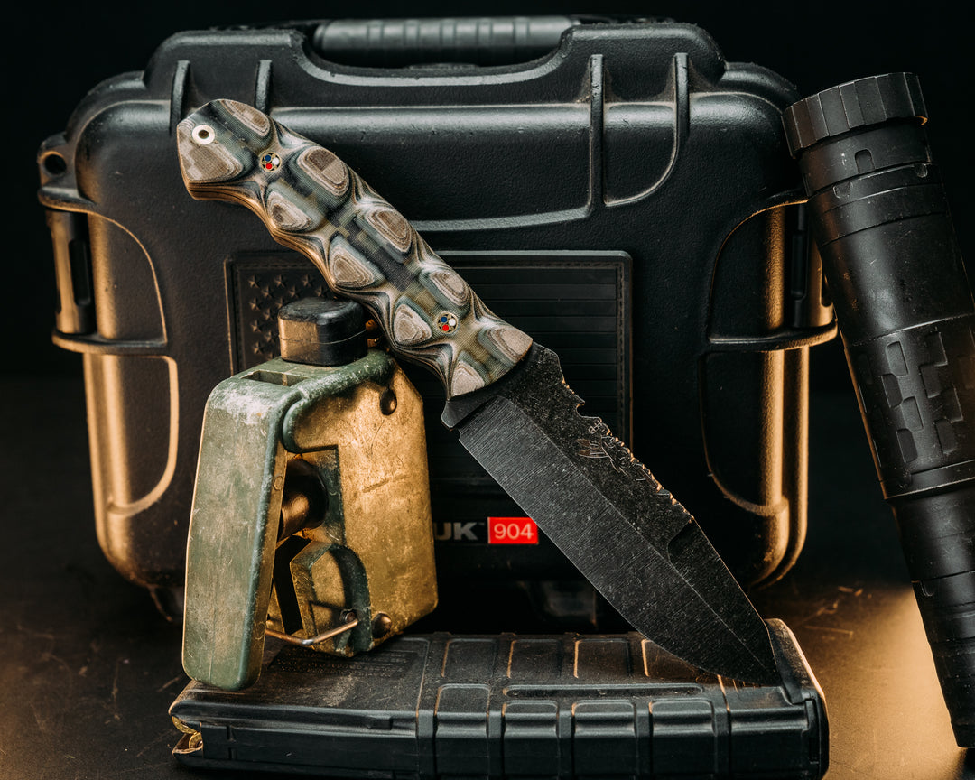 Notched Disaster Breacher- Layered Navy S.E.AL AOR1 and AOR2 Cammie Micarta, Tan and Black G10 Liner, Patriot Mosaic Pins, Brass Lanyard Pin, Textured Grip