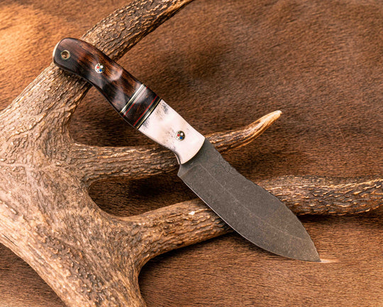 Hunter Skinner- Elk Antler, Black G10, Brass and Cherry G10 Pin Striping, Desert Ironwood Split, Desert Ironwood, Patriot Mosaic Pins, Brass Lanyard Pin, Textured Grip