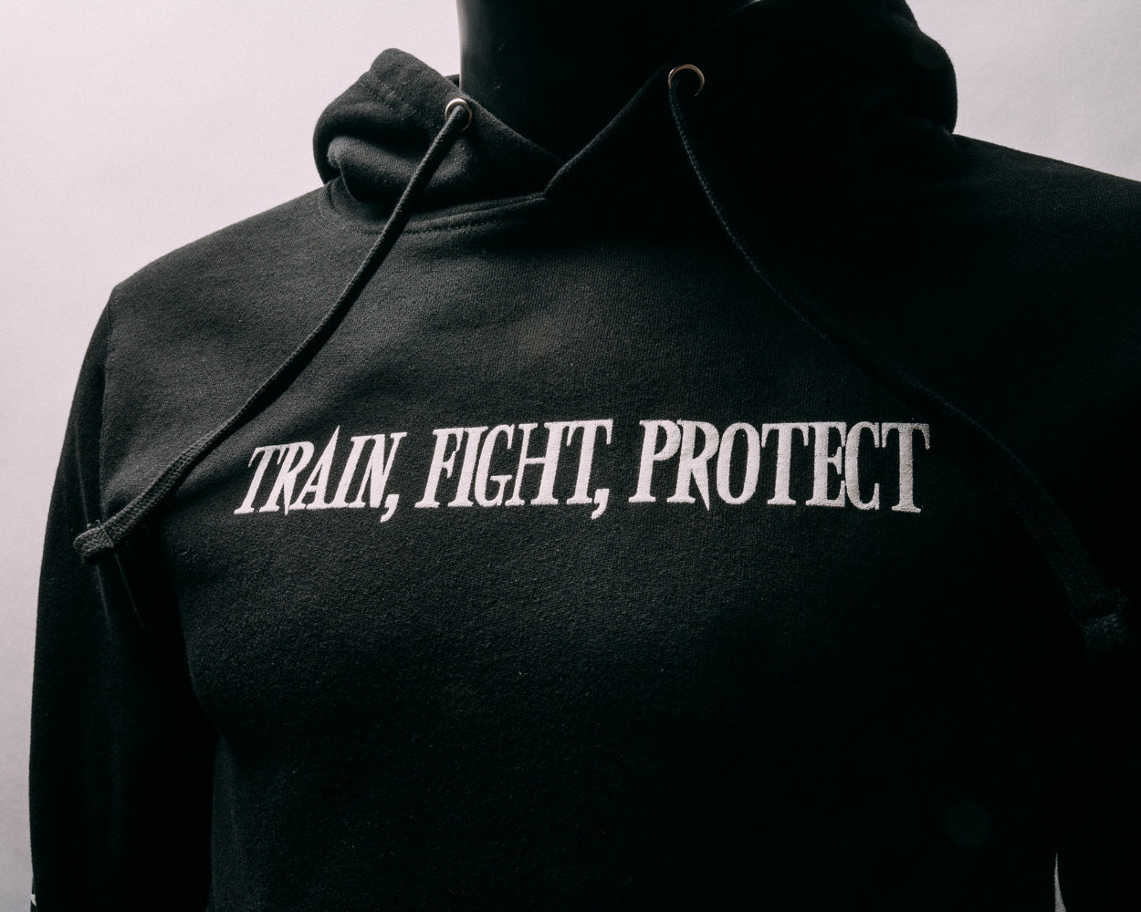 Train, Fight, Protect Hoodie Black