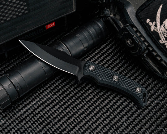 Ishi- Black G10, Armor Black Cerakote, Ti Allen Bolts, Textured Grip