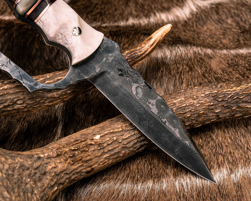 Trench Knife- Baker Forge Raindrop Damascus- Elk Antler, Black G10 and Copper Pin Striping, Desert Ironwood and Rams Horn Split, Mosaic Pins, Textured Grip