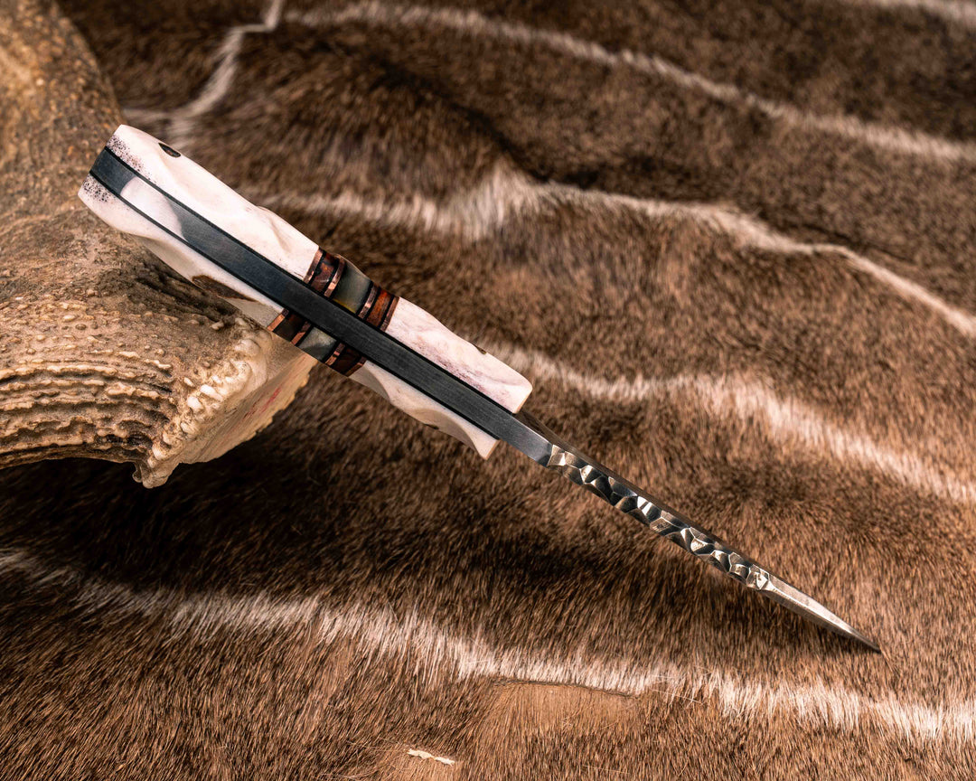 Trench Knife- Baker Forge Raindrop Damascus- Elk Antler, Black G10 and Copper Pin Striping, Desert Ironwood and Rams Horn Split, Mosaic Pins, Textured Grip