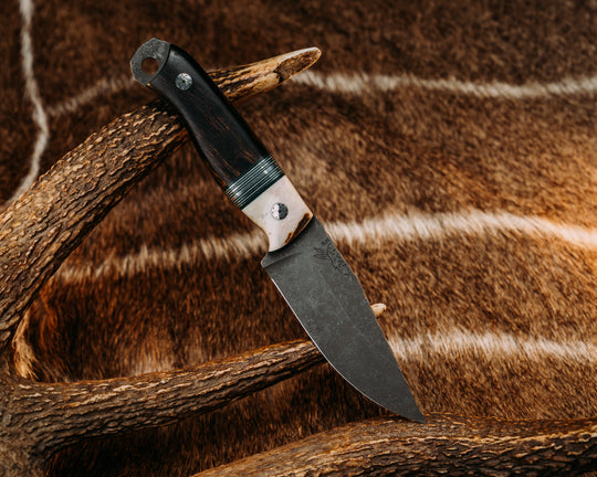 Feather Light- Elk Antler, Black & White G10 Pin Striping, Aluminum Splits, Desert Ironwood, Mosaic Pins, Smooth Grip.
