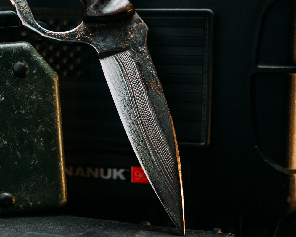 Trench Knife- Baker Forge Random Pattern CopperMai- Dyed Amboyna, Brown Canvas Micarta Pin Striping, Silver Dragon Strike Carbon, Black Burlap Micarta and Black Ash Burl Split, Mosaic Pins, Aluminum Lanyard Pin, Textured Grip