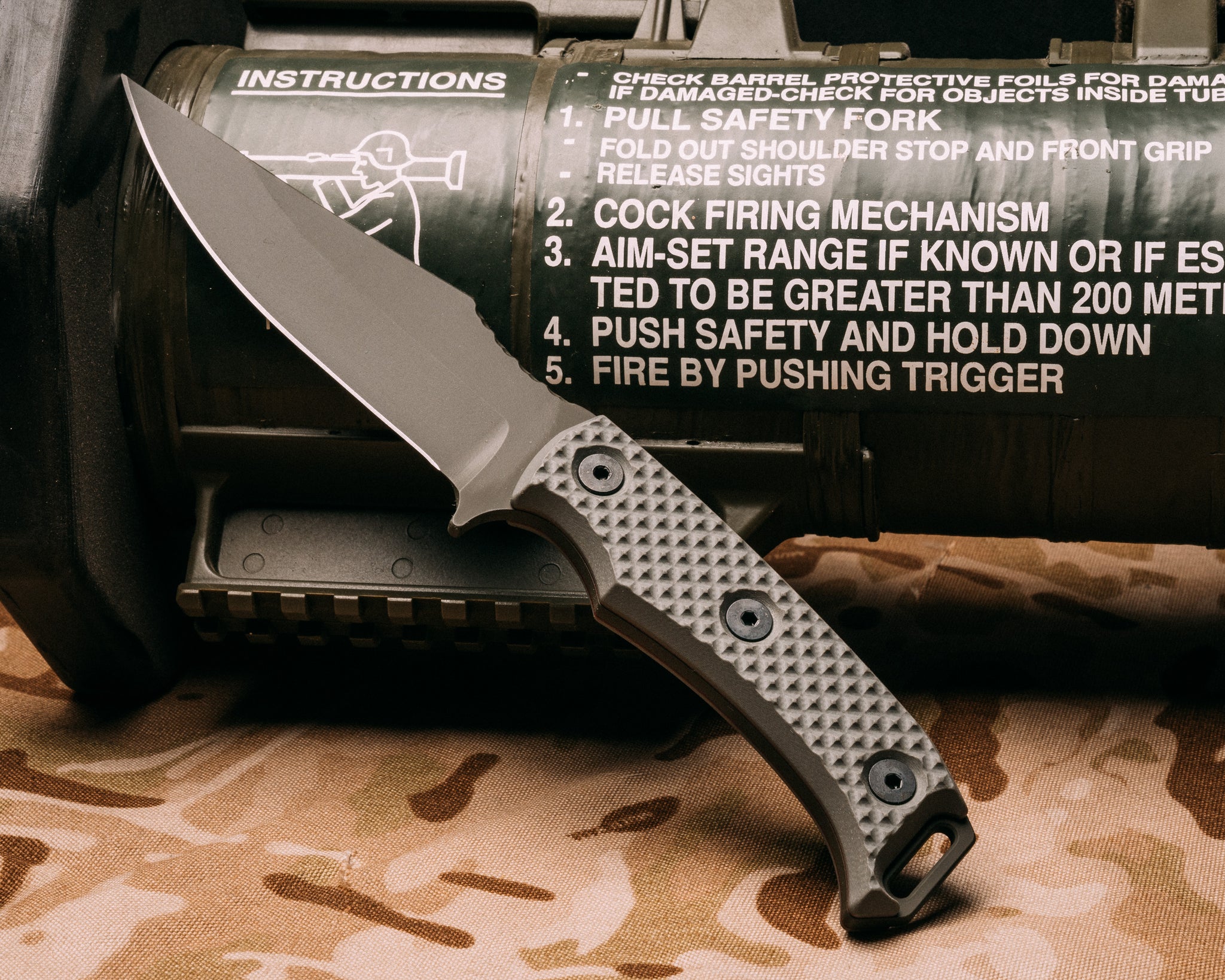 Tosahwi - charcoal grey and ruby G10 liner, OD green cerakote, allen bolts, dimple grip