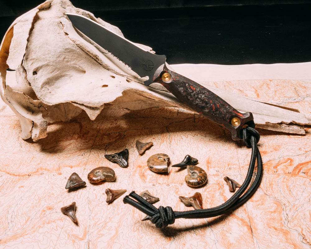 Dive knife- orange dark matter carbon, armor black cerakote, brass allen bolts, smooth angled grip